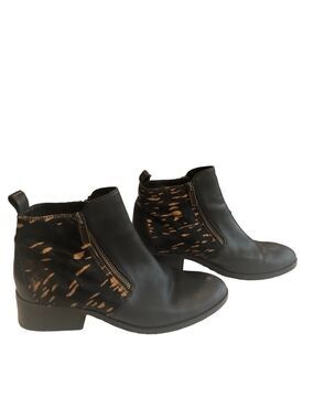 Cole Haan Size 9 leather and animal hair black ankle bootie.